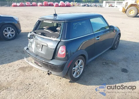 2011 Mini Cooper z USA, uszkodzony, nr VIN WMWSU3C59BTX96719